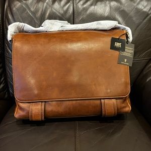 Beautiful, brand new, never used, messenger bag in a classic cognac color.